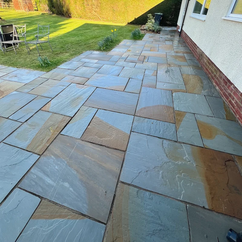 Restored driveway after Puralux pressure washing.